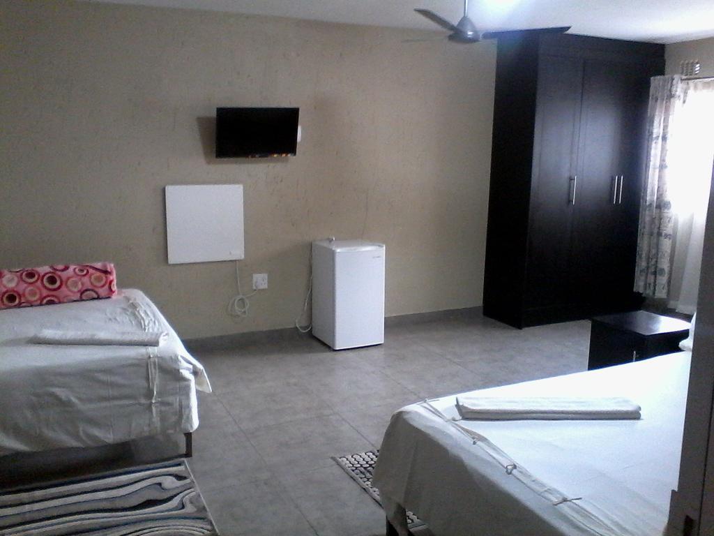 Chisam Guest Lodge Pty Ltd Johannesburg Szoba fotó