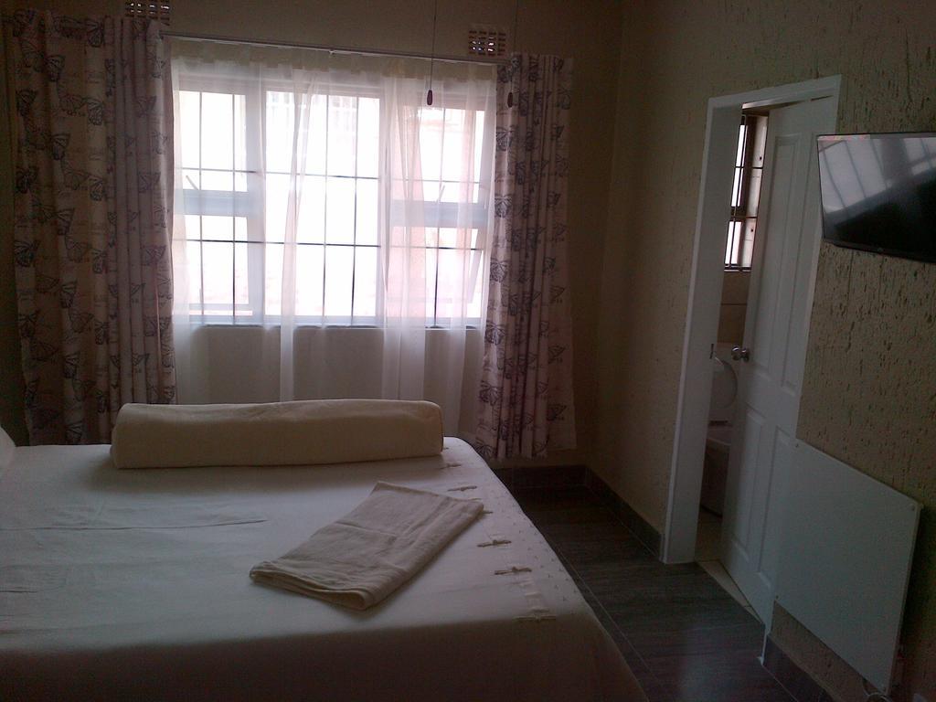 Chisam Guest Lodge Pty Ltd Johannesburg Szoba fotó